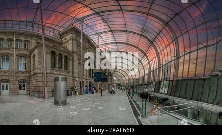 Strasbourg, France - 06 29 2023: View inside the modern Strasbourg train station building with travelers Stock Photo