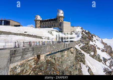 Pathway leading up to the Gornergrat Observatory housed in the building of the Kulmhotel facing the Matterhorn in the Pennine Alps, Canton of Valais, Stock Photo