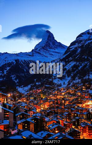 Aerial view of the village of Zermatt overlooked by the Matterhorn peak ...