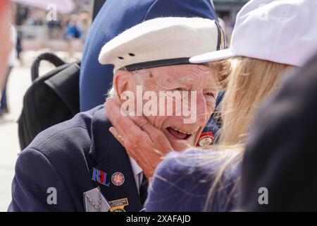 Arromanches-Les Baine. D-Day Veteran Alec Penstone meets affectionate crowds. A poignant service to commemorate the 80th Anniversary of the D Day landings is held on the coastal town of Arromanches. A group of WW2 veterans, the last few, are present to pay respect to memory of the soldiers that did not survive the first few months of the allied campaign, the D-Day Landings and the Battle of Normandy. Credit: Casper Farrell/Alamy News Stock Photo