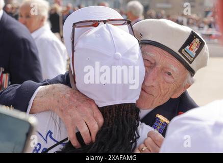 Arromanches-Les Baine. D-Day Veteran Alec Penstone meets affectionate crowds. A poignant service to commemorate the 80th Anniversary of the D Day landings is held on the coastal town of Arromanches. A group of WW2 veterans, the last few, are present to pay respect to memory of the soldiers that did not survive the first few months of the allied campaign, the D-Day Landings and the Battle of Normandy. Credit: Casper Farrell/Alamy News Stock Photo