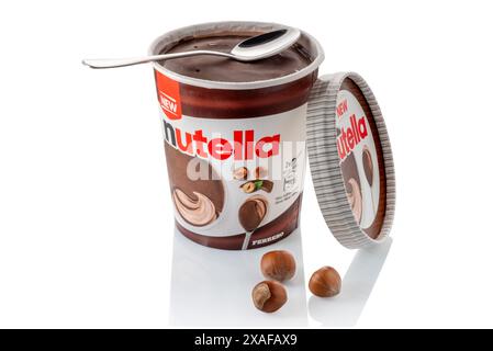 Italy - June 06, 2024: Ferrero Nutella ice cream in jar with teaspoon, chocolate and hazelnut flavored ice cream ice cream, new for summer 2024. Isola Stock Photo