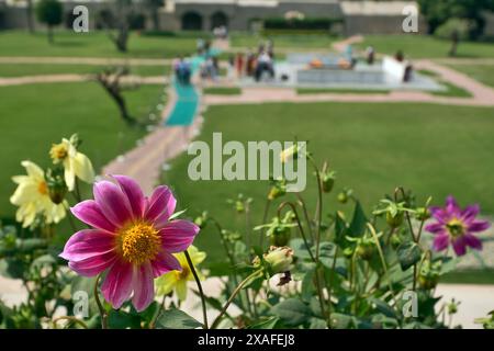 Delhi, India: people pray and commemorate Mahathma Gandhi at Raj Ghat. The memorial was erected in 1951 on the spot where Gandhi's body was cremated Stock Photo