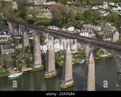 An aerial view of a 19th century railway viaduct crossing a river valley, over the River Tamar, at Calstock, near Gunnislake, Cornwall, Great Britain. Stock Photo