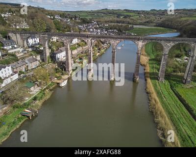 An aerial view of a 19th century railway viaduct crossing a river valley, over the River Tamar, at Calstock, near Gunnislake, Cornwall, Great Britain. Stock Photo