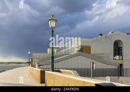 photo of a seafront along Adriatic sea in the city of Grado before a thunderstorm Stock Photo