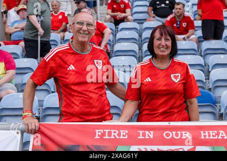 ALGARVE, PORTUGAL - 06 JUNE 2024: Welsh fans during the international friendly fixture between Gibraltar & Cymru at the Estadio Algarve in Portugal on 6th June. (Pic by John Smith/FAW) Stock Photo