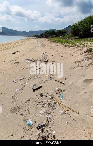 Plastic bags and other trash washed up on the beach of Tampah near Kuta, Lombok Stock Photo
