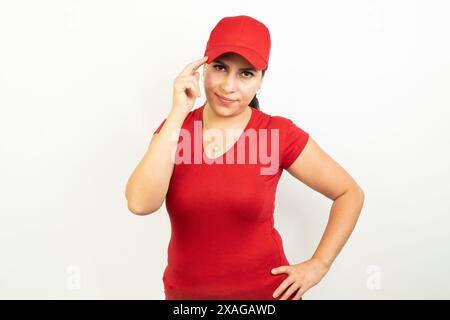 Photo of young smiling lovely confident delivery woman with folded hands professional isolated on white color background Stock Photo