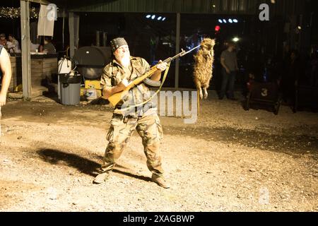 Rodent Rodeo Armed nutria hunters proudly display their rifles at the annual Nutria ...
