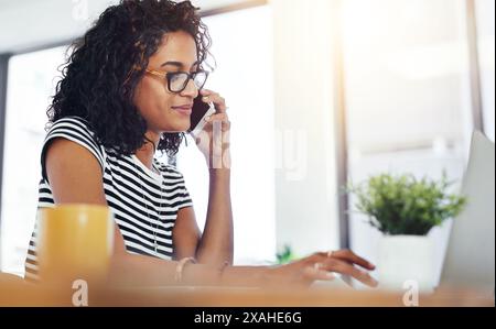 Happy, woman or student with phone call and laptop for elearning, feedback and remote work on essay. Smile, female person and online course with Stock Photo