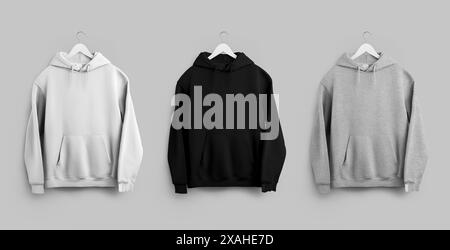 Mockup of a white, black, heather oversized hoodie on a wooden hanger, label on the sleeve, pocket, laces, front view. Set of fashionable universal cl Stock Photo