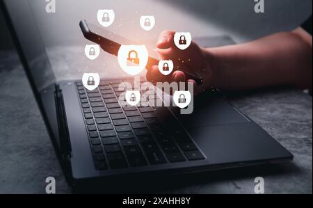 Woman use smartphone with hologram protection interface. Internet security and data protection concept. Blockchain and cybersecurity. Stock Photo