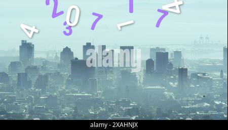Image of multiple changing numbers floating against aerial view of cityscape Stock Photo