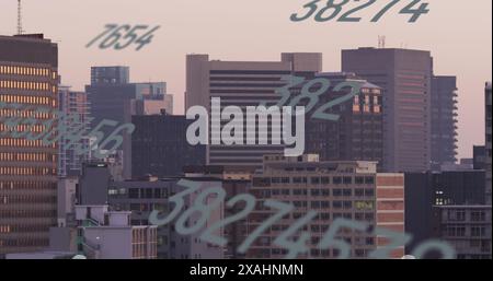 Image of numbers and data processing over cityscape Stock Photo