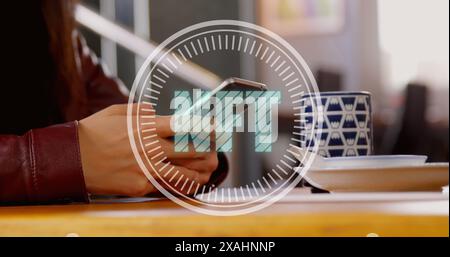 Image of nft text banner against mid section of a woman using smartphone at office Stock Photo