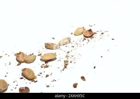 Remains of shells and small crumbs from pistachios. Stock Photo