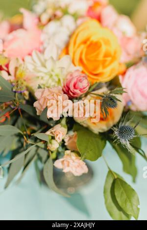 Colorful table flower arrangement for tropical wedding Stock Photo