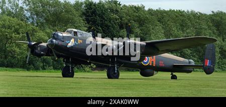 The Avro Lancaster is a British Second World War heavy bomber. It was designed and manufactured by Avro as a contemporary of the Handley Page Halifax. Stock Photo