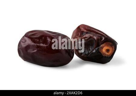 Dried dates close up isolated on white background Stock Photo