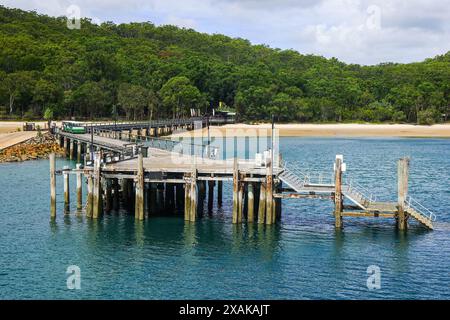 Wooden jetty of Kingfisher Bay on the west coast of Fraser Island (K'gari), where the ferry from Rivers Head travels to the continental Queensland, Au Stock Photo