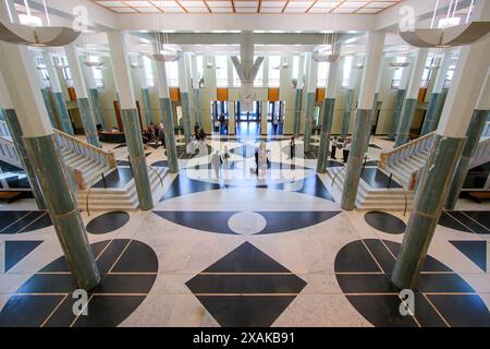 Main foyer of the Parliament House of Australia, decorated with green marble columns and a white marble staircase in Canberra, Australian Capital Terr Stock Photo