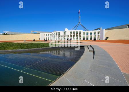 Shallow circular pond in front of the Parliament House of Australia on Capital Hill in Canberra, Australian Capital Territory Stock Photo