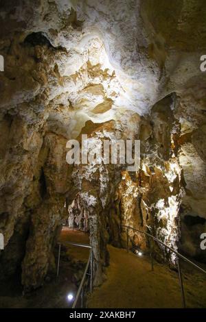 Footpath in the Stick-Tomato Cave in the Naracoorte Caves National Park in South Australia Stock Photo