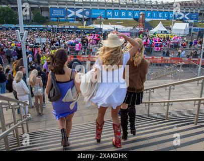 June 7th 2024.  Crowds gather before the Taylor Swift The Eras Tour concert, Scottish Gas, Murrayfield Stadium, Edinburgh,  UK.  Credit: Ian Rutherford/Alamy Live News. Stock Photo