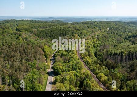 View of the forests of the Harz low mountain range, road, railroad line, Hüttenrode, Saxony-Anhalt, Germany Stock Photo