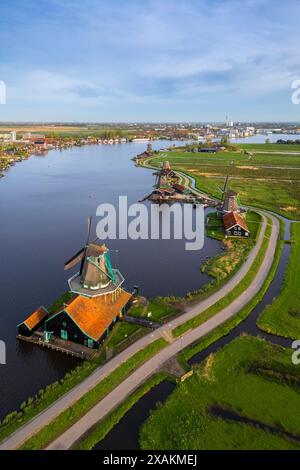 Aerial view of the typical windmills of Zaanse Schans on the river Zaan in spring. Zaanse Schans, North Holland, Zaanstad municipality, The Netherlands, Europe. Stock Photo