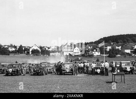 US jeeps, German and American flags at a trophy presentation, meeting of the Bundeswehr and US Army at an awards ceremony Stock Photo