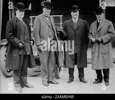 H.J. Titus, Dr. H. Wiley, A.D. Charlton, [and] Dr. Geo. Ainslie, between c1910 and c1915. Shows Hazen J. Titus, the Northern Pacific Railway's superintendent of dining cars; chemist Harvey Washington Wiley (1844-1930); A.D. Charlton, assistant general passenger agent of the Northern Pacific Railway, and Dr. George Ainslie. Stock Photo