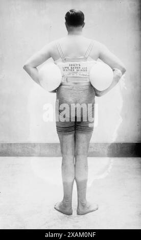 J.N. Callahan, 1913. Shows J.N. Callahan with a livesaving device &quot;Coxey's Life Saver and Water Wings.&quot; Stock Photo