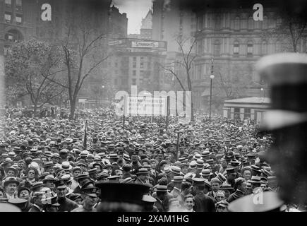 Crowd at Gaynor notification 9/3/13, 1913. Shows the crowd at the notification ceremony that took place on September 3, 1913 on the steps of City Hall, New York City, where Mayor William J. Gaynor was nominated for re-election.  William Jay Gaynor had served a term as reform mayor of New York. Because the incorruptible Gaynor would not cooperate with the Tammany machine, Tammany refused to nominate him for a second term. So Gaynor was renominated by an independent group, and accepted their nomination. Stock Photo