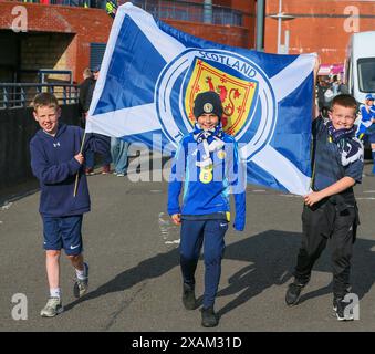 Glasgow, UK. 07th June, 2024. Scotland football fans arrive early to support their team, playing in a friendly uefa international at Hampden Park, Glasgow, Scotland, UK. This is the last game Scotland will play before playing Germany in the opening match of the EUROs. Credit: Findlay/Alamy Live News Stock Photo