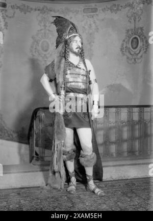 Albert Herter, 1914. Shows artist Albert Herter (1871-1950) dressed as Byzantine Emperor Justinian for a Venetian pageant which was part of the fine arts ball arranged by the Society of Beaux Arts Architects, held at the Hotel Astor, New York City on February 20, 1914. Stock Photo