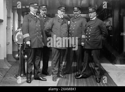 On the Imperator, Captain H. von Meibom, Com. Ruser, Captain A. Hoefer, Captain H. Schetelig, Captain K. Meyer, 1913. Shows the crew of the S.S. Imperator, an ocean liner of the Hamburg America Line in New York City. The Imperator arrived in New York City on June 19, 1913. Stock Photo