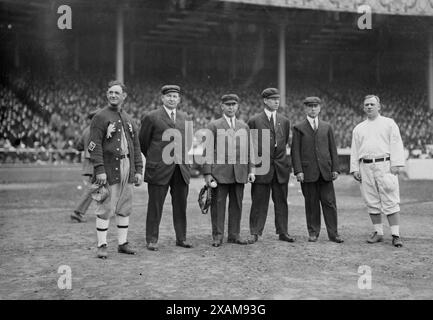 Umpires, World Series, '13, 1913. Shows managers and umpires before Game One of the 1913 World Series on October 7 at the Polo Grounds in New York City. From left to right: Danny Murphy, Philadelphia Athletics team captain; Cy Rigler, left-field umpire; Bill Klem, home plate; John Joseph (Rip) Egan, infield; Tom Connolly, right field; and John McGraw, manager of the New York Giants. Stock Photo