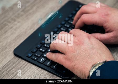 Unrecognizable caucasian man's hands typing in a computer keyboard while a virtual HUD appears over it with a search form. Stock Photo
