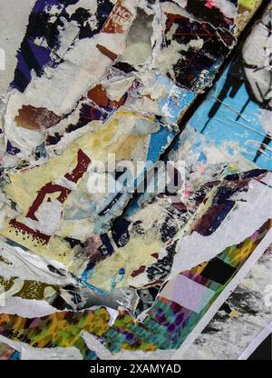 torn paper texture, multicoloured wall posters Stock Photo