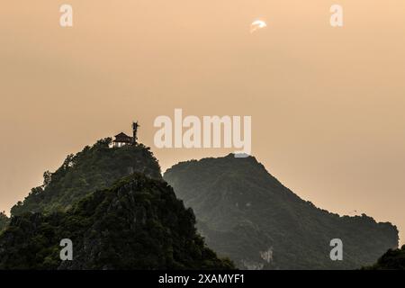 Stunning Ti Top Island in heart of the Alluring Long Bay, Vietnam. Astounding, Breathtaking, Compelling, Glorious, Intriguing, Incredible,Jaw-dropping Stock Photo