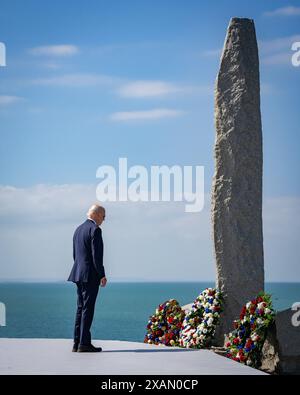 Normandy, France. 05th June, 2024. US President Joe Biden stands before a monument adorned by wreaths on 'Pointe du Hoc' clifftop in Cricqueville-en-Bessin, northwestern France, on Friday on June 7, 2024. As part of the 'D-Day' commemorations marking the 80th anniversary of the World War II Allied landings in Normandy. Photo by Office of US President/UPI Credit: UPI/Alamy Live News Stock Photo