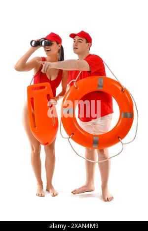 Lifeguards with ring buoy, rescue tube and binoculars spotted something on white background Stock Photo