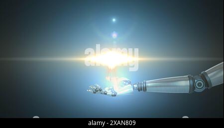 Spot of light over robotic hand against copy space on blue background Stock Photo