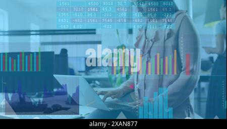 Image of arrows, binary coding and data processing over biracial business woman Stock Photo