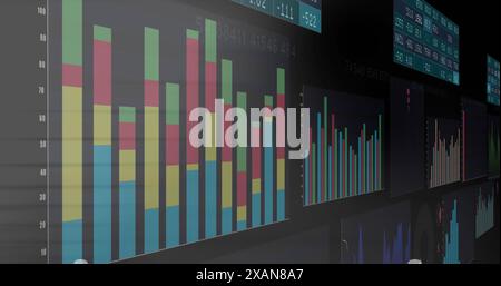 Image of multiple screens with statistical data processing against grey background Stock Photo