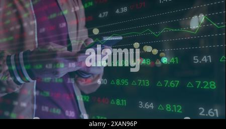 Image of stock market data processing against mid section of a man using smartphone Stock Photo