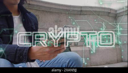 Image of crypto text and data processing over biracial man using smartphone Stock Photo
