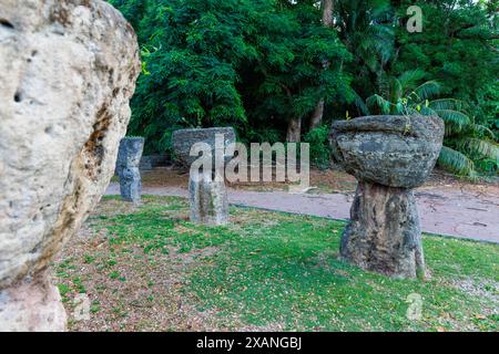 Ancient stone pillars in Latte Stone Park, Agana, Guam, Micronesia, Mariana Islands, Pacific Ocean. These latte stones were relocated in 1956 from the Stock Photo